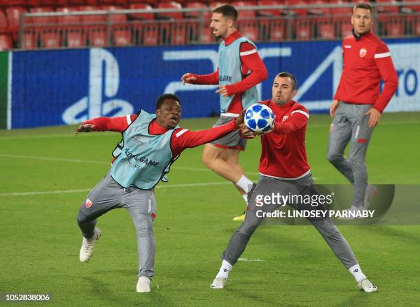 Red Star Belgrade's Ghanaian defender Rashid Sumaila takes part in a training session at Anfield in Liverpool, north west England on October 23 on...