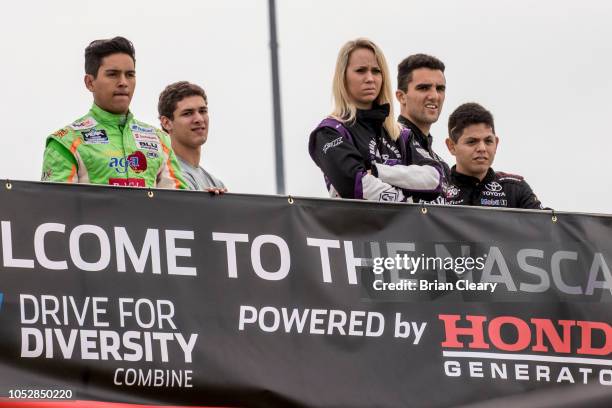 Left to right, Juan Manuel Gonzalez, of Mexico, Perry Patino, Brooke Storer, Loris Hezemans, of the Netherlands, and Ryan Vargas watch the action...