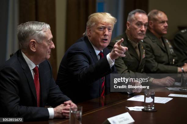 President Donald Trump speaks as Jim Mattis, U.S. Secretary of defense, left, and General Joseph Dunford, chairman of the Joint Chiefs of Staff,...