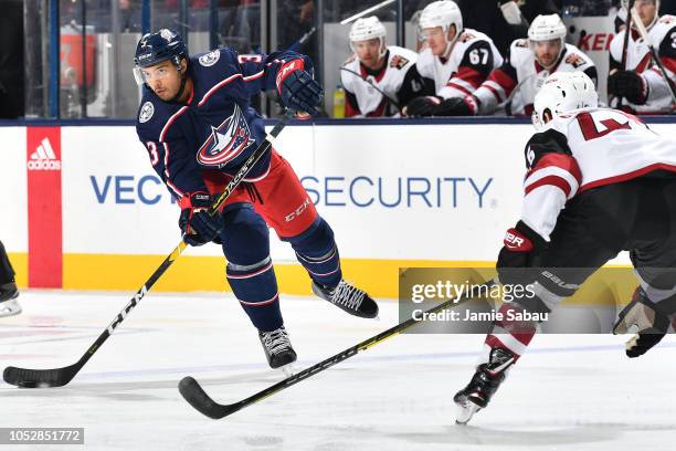 Seth Jones of the Columbus Blue Jackets looks to pass the puck against the Arizona Coyotes in the first period on October 23, 2018 at Nationwide...