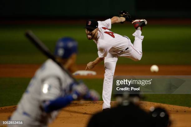 Chris Sale of the Boston Red Sox delivers the pitch during the first inning against the Los Angeles Dodgers in Game One of the 2018 World Series at...