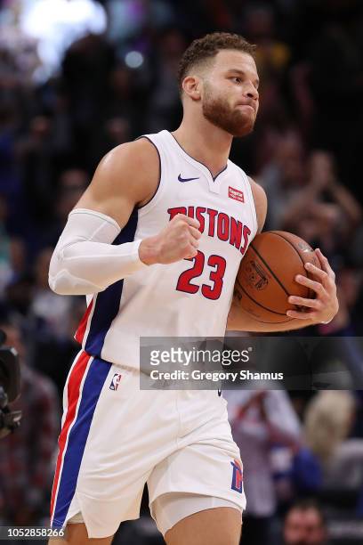 Blake Griffin of the Detroit Pistons celebrates a 133-132 overtime win over the Philadelphia 76ers at Little Caesars Arena on October 23, 2018 in...