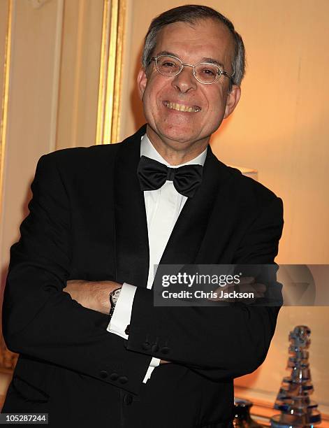 Mr Maurice Gourdault-Montagne smiles after making architect Zaha Hadid a Commandeur dans l�Ordre des Arts & des Lettres at the French Ambassador�s...