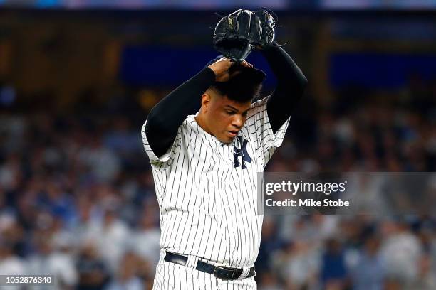 Dellin Betances of the New York Yankees reacts against the Boston Red Sox during the eighth inning in Game Four of the American League Division...