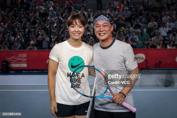 Singer Eason Chan and retired tennis player Li Na attend a star friendly match on day two of the Prudential Hong Kong Tennis Open 2018 on October 9,...