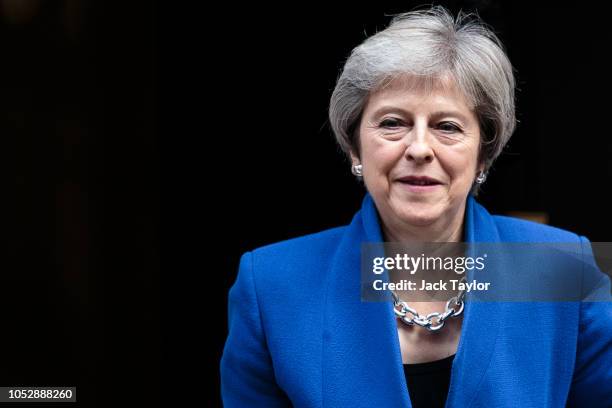 British Prime Minister Theresa May leaves Number 10 Downing Street on October 24, 2018 in London, England. Mrs May is expected to discuss the ongoing...