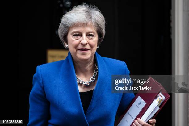 British Prime Minister Theresa May leaves Number 10 Downing Street on October 24, 2018 in London, England. Mrs May is expected to discuss the ongoing...