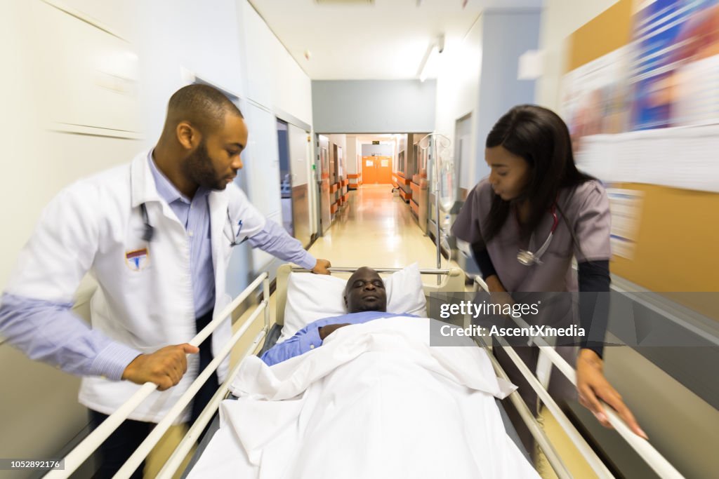 Patient Rushed Rushing A Patient To The Emergency Room High-Res Stock Photo - Getty Images