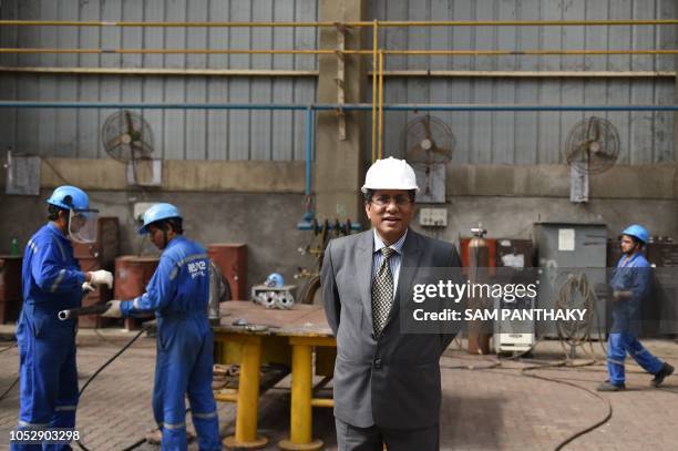 Reliance Naval and Engineering Ltd. Chief Executive Officer Debashis Bir poses for a picture at the RNEL shipyard in Pipavav, some 340 kms from...