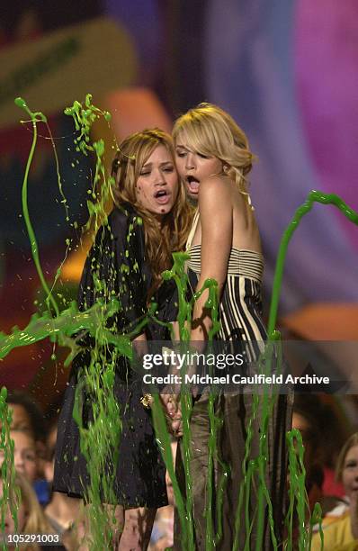 Mary-Kate Olsen and Ashley Olsen getting slimed during Nickelodeon's 17th Annual Kids' Choice Awards - Show at Pauley Pavillion in Westwood,...