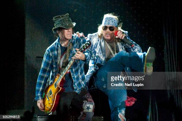 Dj Ashba and Axl Rose of Guns N' Roses perform on stage during the opening night of the Chinese Democracy UK tour at O2 Arena on October 13, 2010 in...