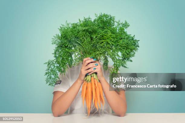 carrot woman - funny vegetable stock pictures, royalty-free photos & images