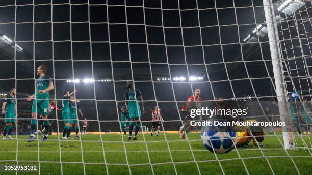 Luuk de Jong of PSV Eindhoven scores his team's second goal past Michel Vorm of Tottenham Hotspur during the Group B match of the UEFA Champions...