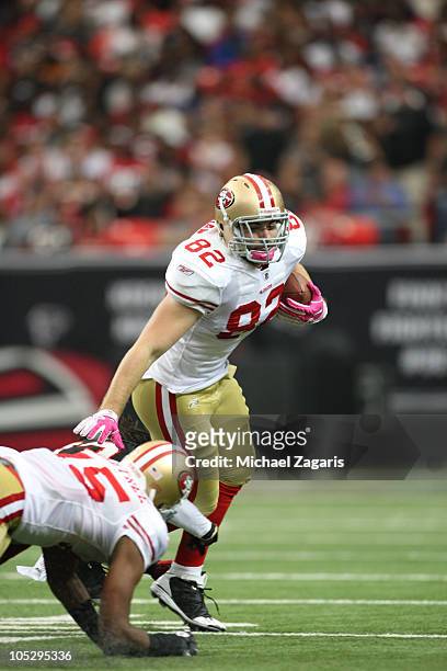 Nate Byham of the San Francisco 49ers makes a reception during the game against the Atlanta Falcons at the Georgia Dome on October 3, 2010 in...
