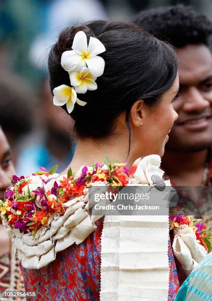 Prince Harry, Duke of Sussex and Meghan, Duchess of Sussex attend University of the South Pacific on October 24, 2018 in Suva, Fiji. The Duke and...