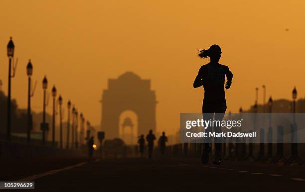 An athlete competes in the Women's Marathon at Vijay Chowk during day eleven of the Delhi 2010 Commonwealth Games on October 14, 2010 in Delhi, India.