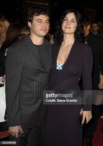 Carrie-Anne Moss and Steven Roy during "The Matrix Revolutions" Premiere at Disney Concert Hall in Los Angeles, California, United States.