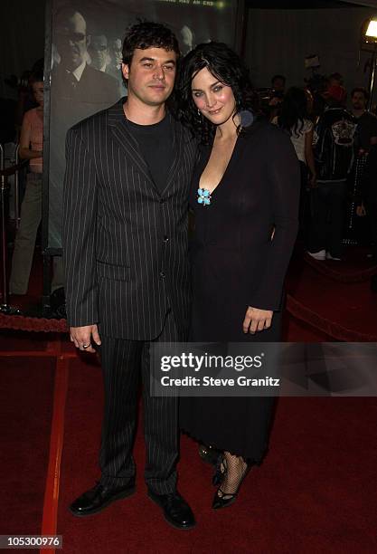 Carrie-Anne Moss and Steven Roy during "The Matrix Revolutions" Premiere at Disney Concert Hall in Los Angeles, California, United States.