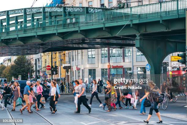 belebte straße in berlin, deutschland - pedestrians stock-fotos und bilder