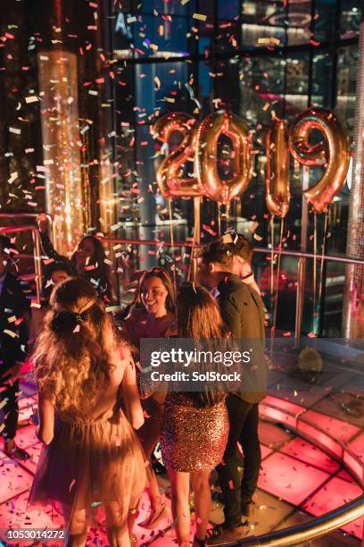 ringing in the 2020 new year! - new years eve 2020 stock pictures, royalty-free photos & images