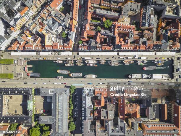 aerial view of nyhavn (new harbour) at dawn, copenhagen, denmark. taken by drone from straight above. - copenhagen aerial stock pictures, royalty-free photos & images