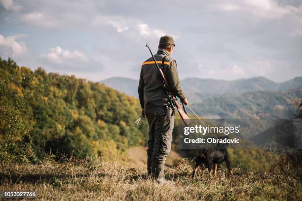 hunter with dog - hunting stock pictures, royalty-free photos & images