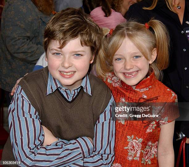 Spencer Breslin and Dakota Fanning during "The Cat In The Hat" World Premiere at Universal Studios Cinema in Universal City, California, United...