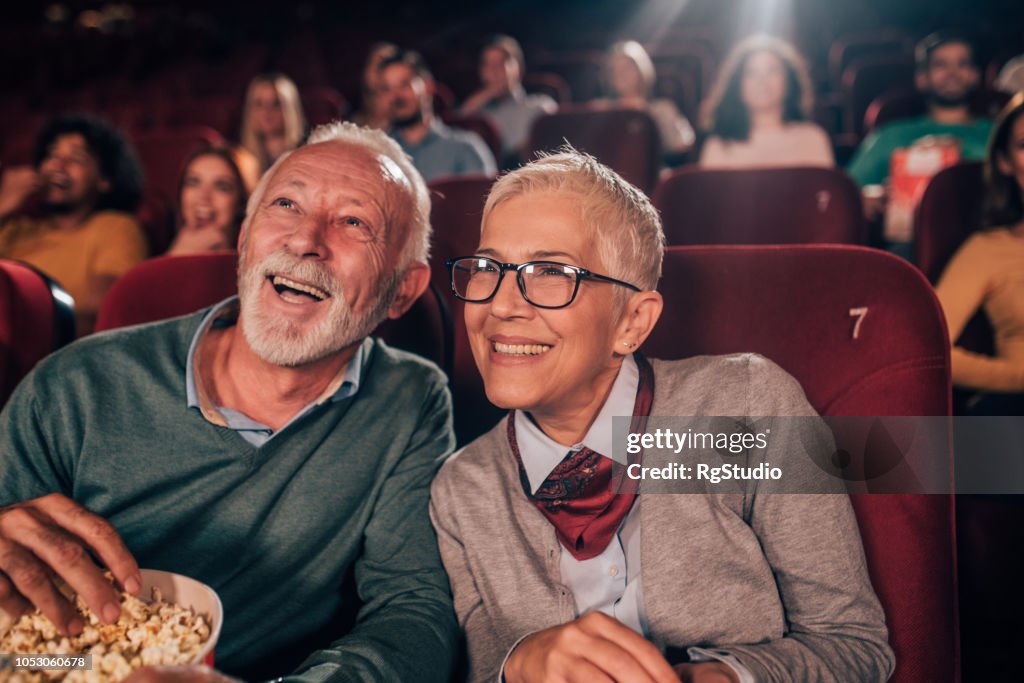 Smiling couple at cinema