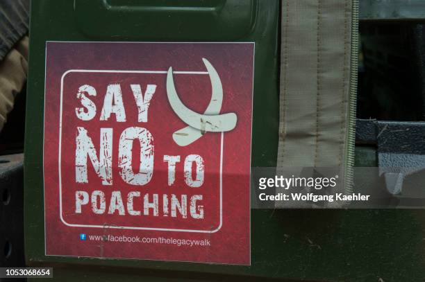 Anti poaching bumper sticker on a safari vehicle in the Masai Mara National Reserve in Kenya.