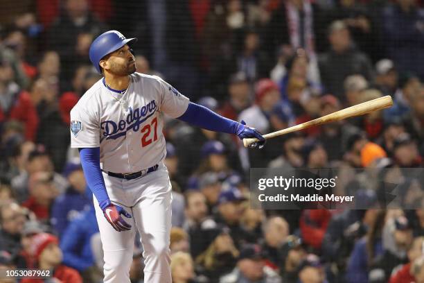 Matt Kemp of the Los Angeles Dodgers hits an RBI sacrifice fly during the fourth inning against the Boston Red Sox in Game Two of the 2018 World...