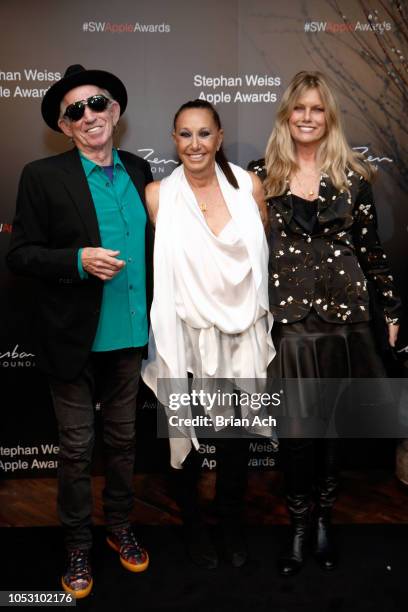 Keith Richards, Donna Karan, and Patti Hansen attend the Stephan Weiss Apple Awards at Urban Zen on October 24, 2018 in New York City.