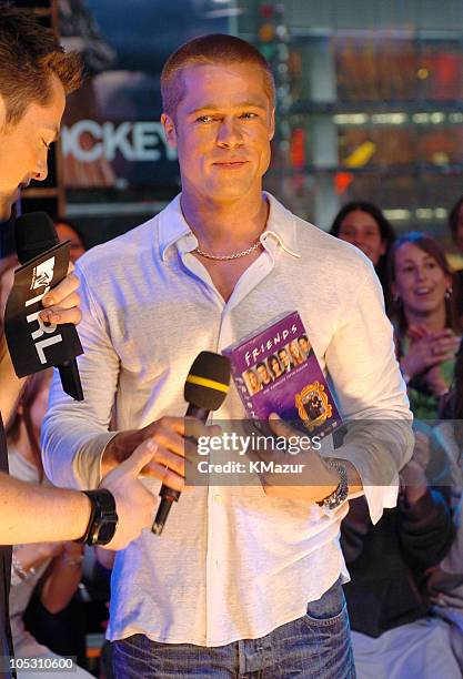 Brad Pitt during Brad Pitt and Eric Bana Visit MTV's "TRL" - May 3, 2004 at MTV Studios, Times Square in New York City, New York, United States.