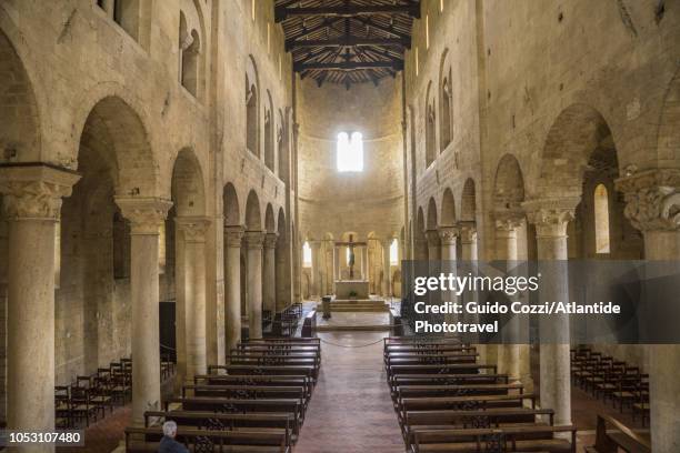 central nave of the sant'antimo abbey - the romanesque church bildbanksfoton och bilder