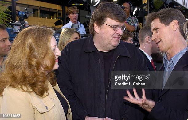 Cathleen Moore, producer, Michael Moore, writer/director/producer and Jon Feltheimer, CEO of Lions Gate