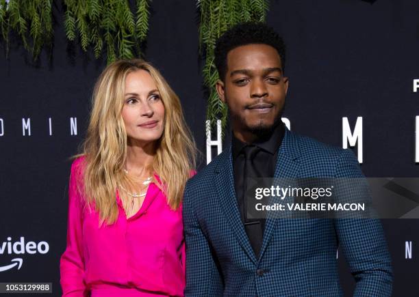 Actress Julia Roberts and Canadian actor Stephan James attend the Los Angeles premiere of Amazon's "Homecoming" in Westwood, California, on October...