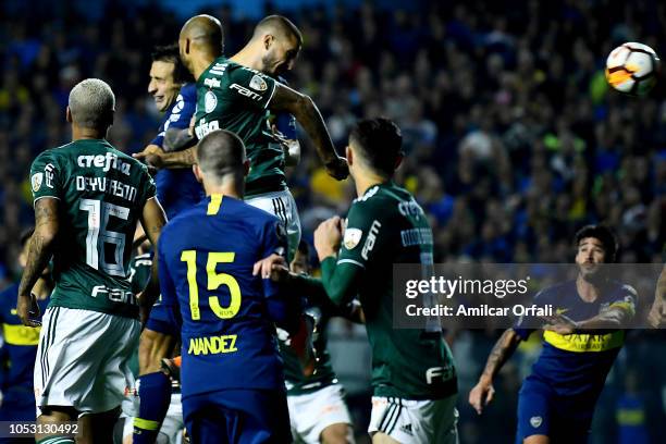 Dario Benedetto of Boca Juniors scores the first goal of his team during the Semi Final first-leg match between Boca Juniors and Palmeiras as part of...