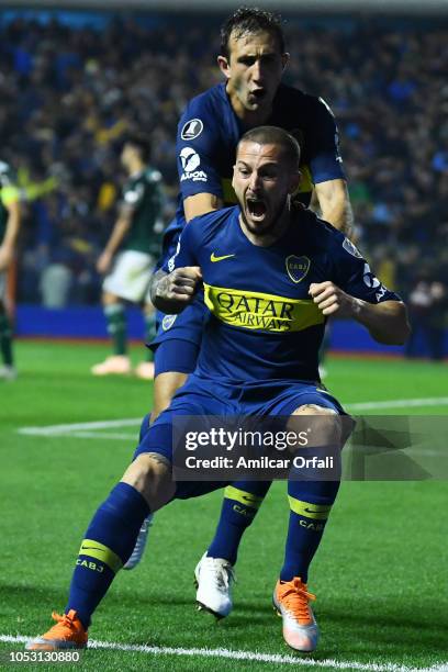 Dario Benedetto of Boca Juniors celebrates after scoring the first goal of his team with teammate Carlos Izquierdoz during the Semi Final first-leg...