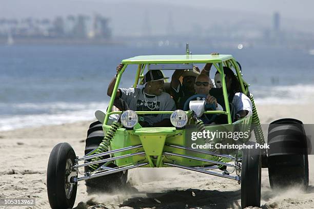 Nelly and Murphy Lee drive a dunebuggy to the MTV "Summer on the Run" Beach House 2004