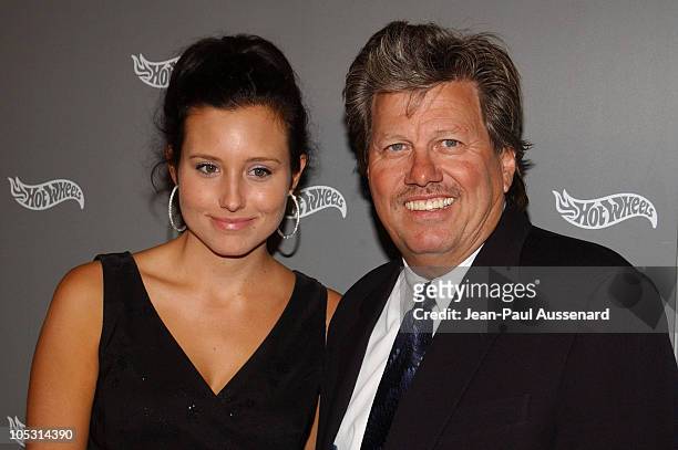 Ashley Force and John Force during Hot Wheels Hall of Fame Induction Gala and Charity Benefit - Orange Carpet at Petersen Automotive Museum in Los...