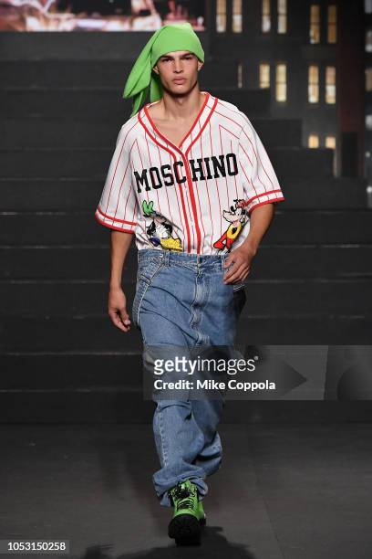 Model walks the runway during the Moschino x H&M - Runway at Pier 36 on October 24, 2018 in New York City.