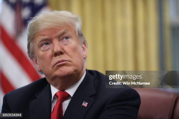 President Donald Trump discusses the potential impact of Hurricane Michael during a meeting with Homeland Security Secretary Kirstjen Nielsen and...