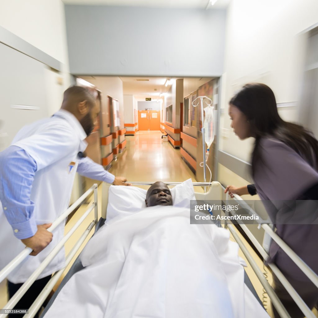 Patient Rushed Rushing A Patient To The Emergency Room High-Res Stock Photo - Getty Images