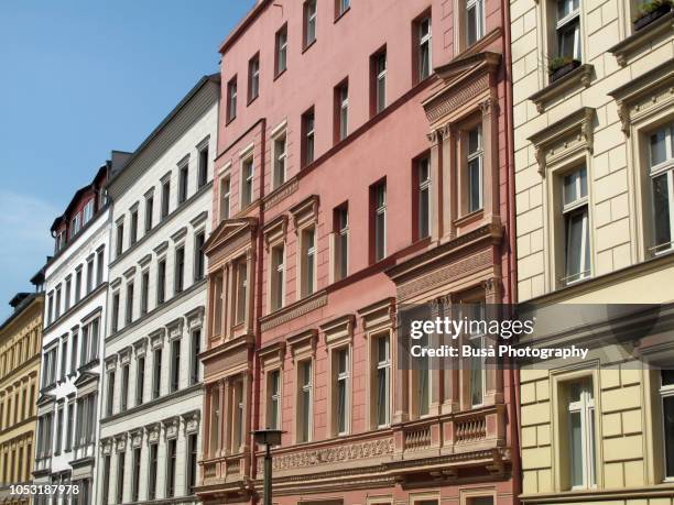 row of ornate pre-war residential buildings in the district of prenzlauerberg, berlin, germany - prenzlauer berg stock pictures, royalty-free photos & images