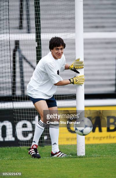 Young West Ham United player Joe Cole has a go in between the sticks during an Adidas Predator launch media day at Craven Cottage on May 21, 1999 in...