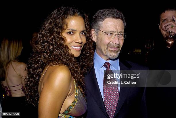 Halle Berry and Barry Meyer of Warner Bros during "Catwoman" Premiere - After Party at Parking Lot of Archlight Cinema in Hollywood, California,...