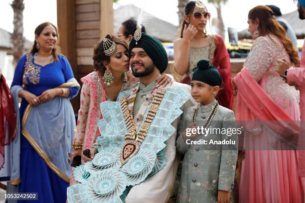 The groom Arjun Arora wearing wedding gifts during his and Sukriti Grover's wedding in Antalya, Turkey on October 25, 2018. Almost 600 guests were...