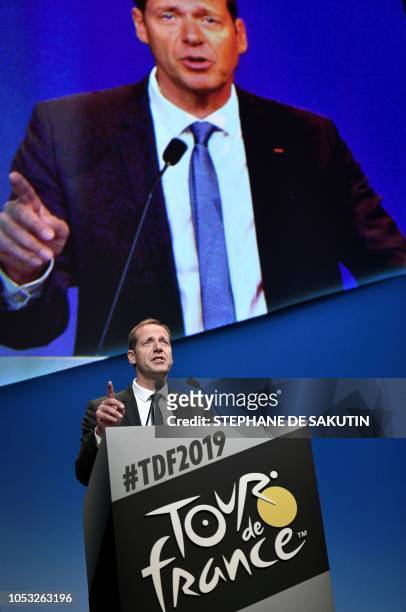 General Director of the Tour de France, France's Christian Prudhomme speaks on stage in Paris on October 25, 2018 during the presentation of the...