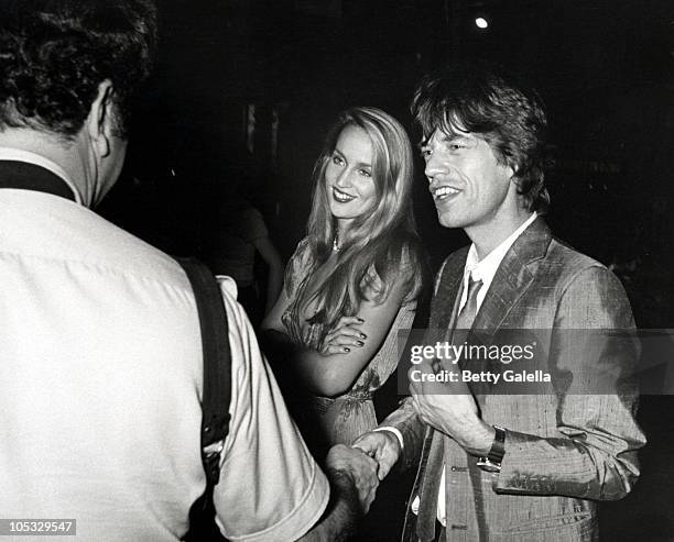 Ron Galella, Jerry Hall and Mick Jagger during Jim Carol Performance at Trax in New York City, New York, United States.