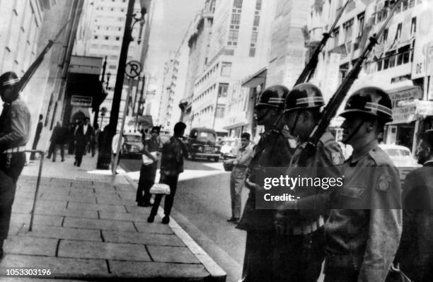 Brazilian soldiers patrol the streets of Sao Paulo on April 03, 1964 after the military putsch that led to the overthrow of President Joao Goulart by...