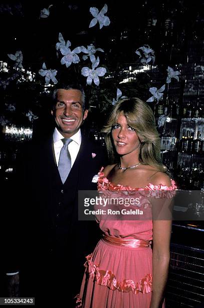 George Hamilton and girlfriend Liz Treadwell during Regine's 7th Anniversary Party at Regine's in New York City, New York, United States.